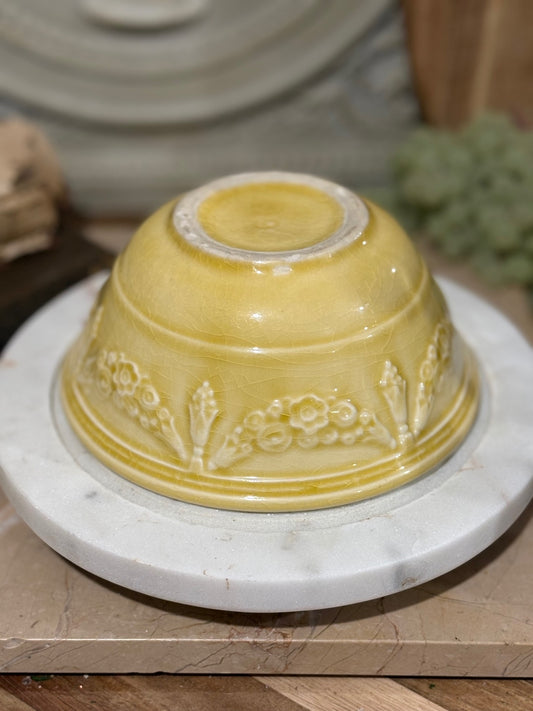 Antique Rare yellow-glazed ceramic bowl with an embossed floral and scroll pattern 6in