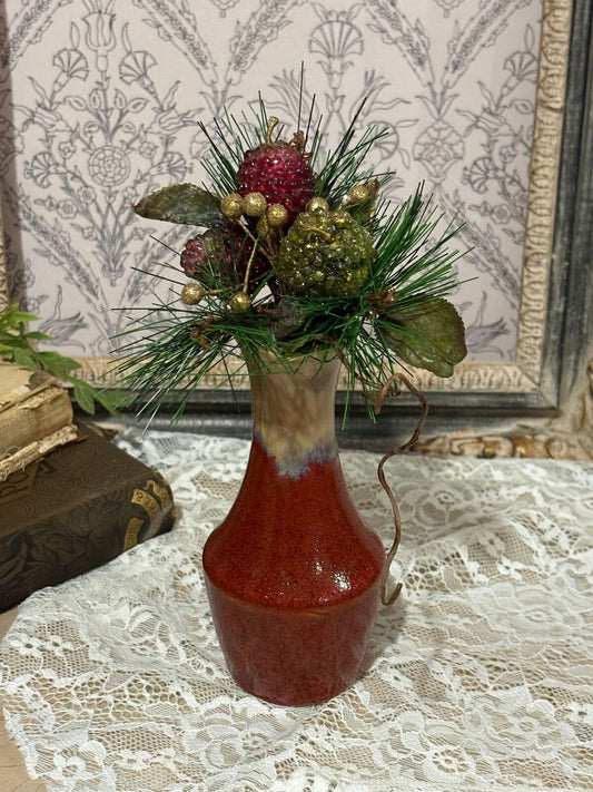 Pottery vase, and Christmas sprig
