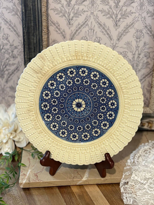 Stained and crazed blue floral textured plate