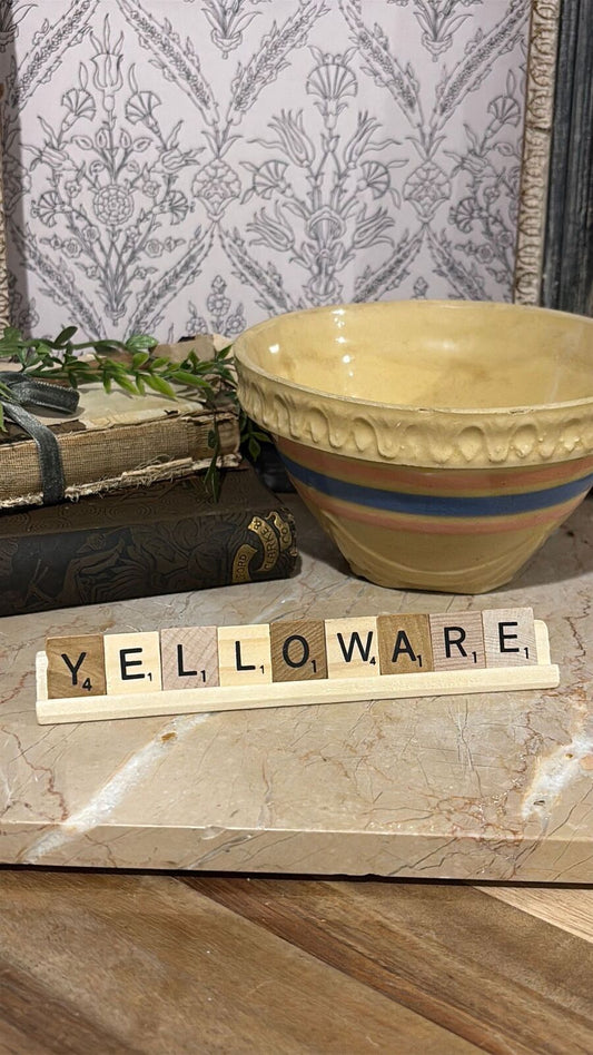 “Yelloware” scrabble letter tiles and stand