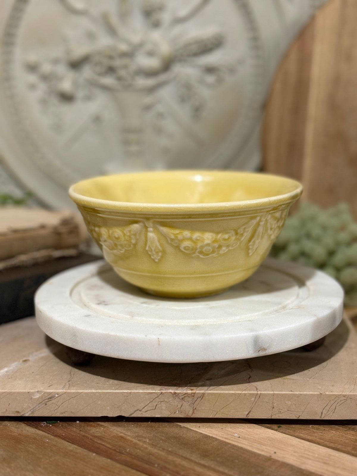 Antique Rare yellow-glazed ceramic bowl with an embossed floral and scroll pattern 6in