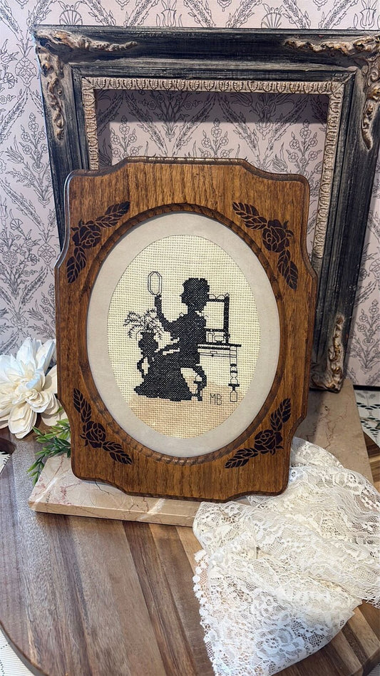 Beautiful wood framed needlepoint, silhouette
